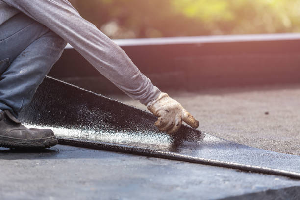 Professional Waterproofing technician working in Harvest, AL